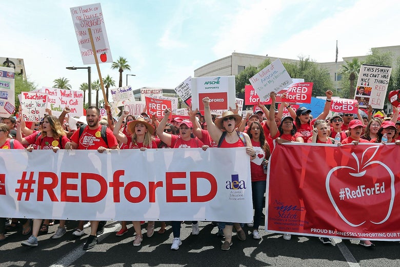 Arizona teachers march through downtown Phoenix